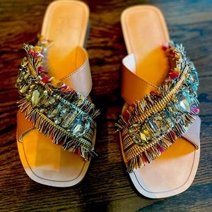 Excellent condition- leather slides